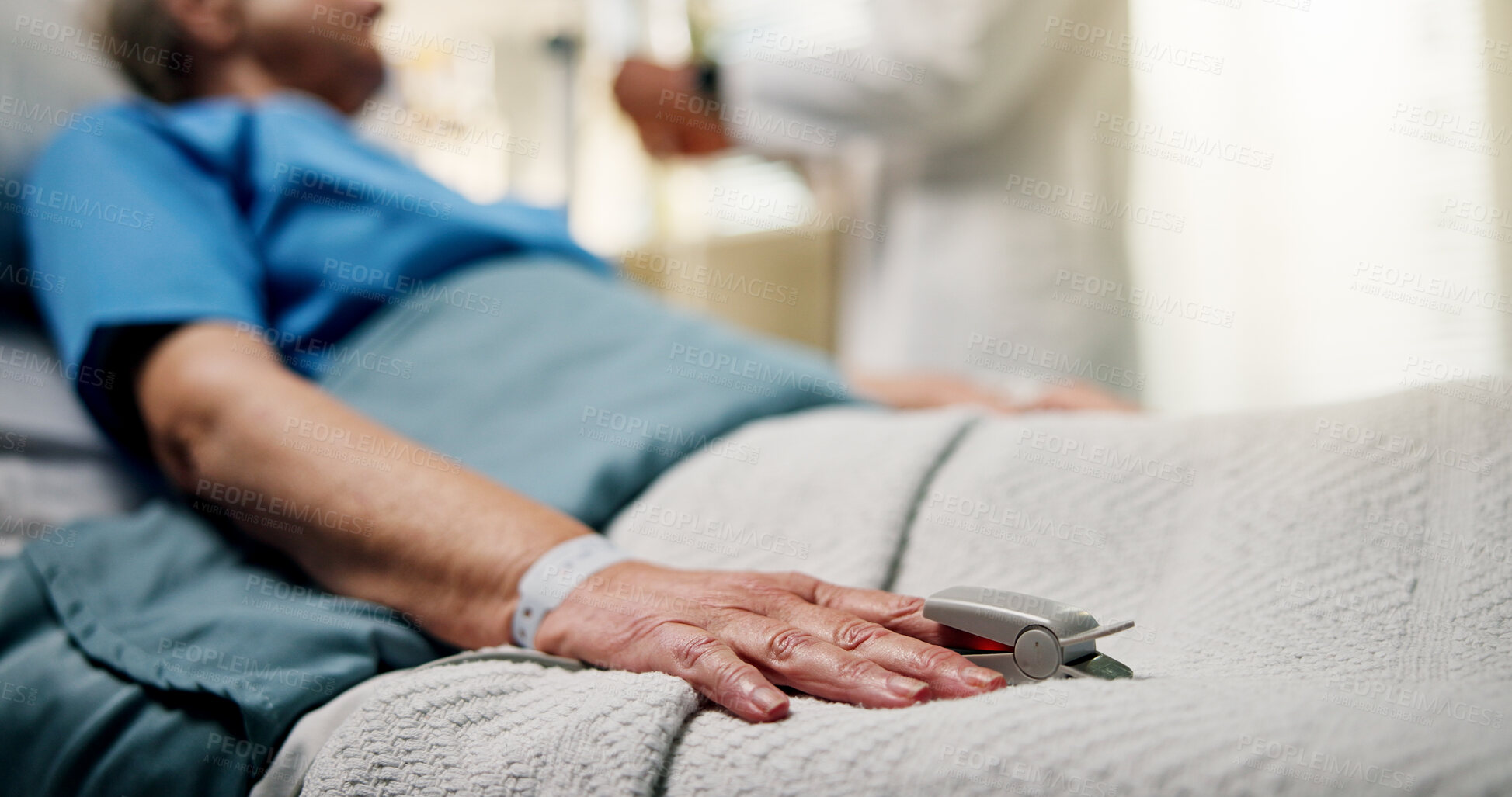 Buy stock photo Hands, senior person and oximeter in hospital bed to monitor pulse, blood levels and surgery recovery. Closeup, elderly patient and medical device to track oxygen, chronic condition and critical care