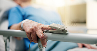 Buy stock photo Hands, old person and oximeter in hospital bed to monitor pulse, blood pressure and surgery recovery. Closeup, elderly patient and medical machine to track oxygen, chronic condition and critical care