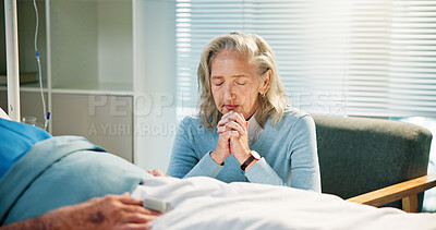 Buy stock photo Senior patient, wife and praying at hospital bed for health recovery, terminal illness and belief. Healthcare, old couple and sick man with worship in clinic for surgery procedure, healing and faith