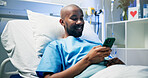 Medical, rest and black man in hospital with phone, video streaming or message update on surgery. Healthcare, relax and patient in clinic with tech, digital scroll or online communication in recovery