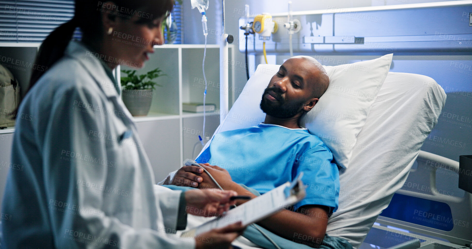 Buy stock photo Doctor, clipboard and man in hospital bed, discussion and feedback for diagnosis. Medical service, patient information and professional in clinic, healthcare and documents for test results or explain