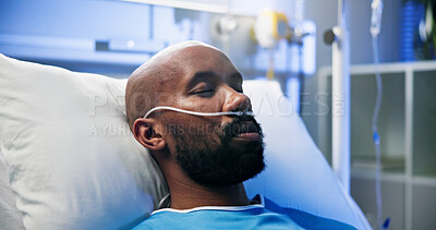 Buy stock photo Man, oxygen tubes and sleeping on hospital bed for surgery recovery, healthcare or healing. Sick patient, black person or rest with nasal cannula in ICU for respiratory support or medical ventilation