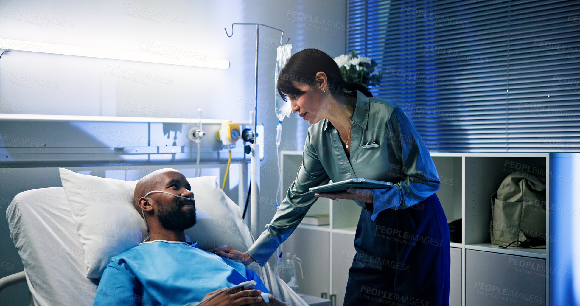 Buy stock photo Healthcare, tablet and doctor with man in hospital for surgery recovery, healing or advice. Medical feedback, digital technology and surgeon with male patient for consultation with support in clinic.