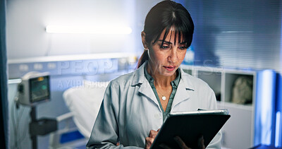 Buy stock photo Doctor, woman and tablet for planning in hospital with reading for healthcare or consultation. Typing, support and service with person for diagnosis, medical treatment and results in night clinic