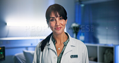Buy stock photo Portrait, happy woman and doctor in hospital for night shift, confident or healthcare services for career.Professional, medical expert and mature person with pride for patient care, dark and wellness