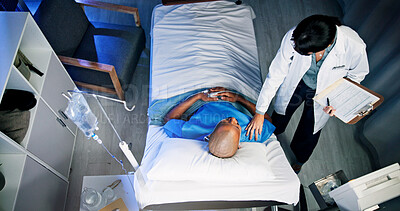 Buy stock photo Medical, checkup and doctor with man in hospital for surgery recovery, healing or advice. Feedback, conversation and top view of surgeon with male patient for consultation with support in clinic.