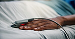 Hands, sick patient and oximeter in hospital bed for blood levels, monitor pulse and recovery. Healthcare, ill person and medical tool in clinic to track health condition, critical care and inpatient