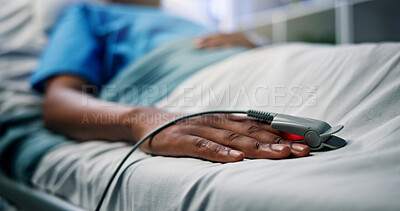 Buy stock photo Hands, ill patient and oximeter in hospital bed for blood levels, monitor pulse and recovery. Healthcare, sick person and medical tool in clinic to track health condition, critical care and healing