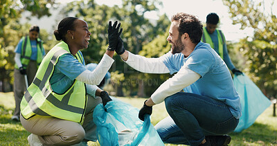 Buy stock photo High five, volunteering and people in park, cleaning and support with teamwork. Outdoor, man and woman with trash bag, gesture and motivation with collaboration, eco friendly campaign and NGO charity