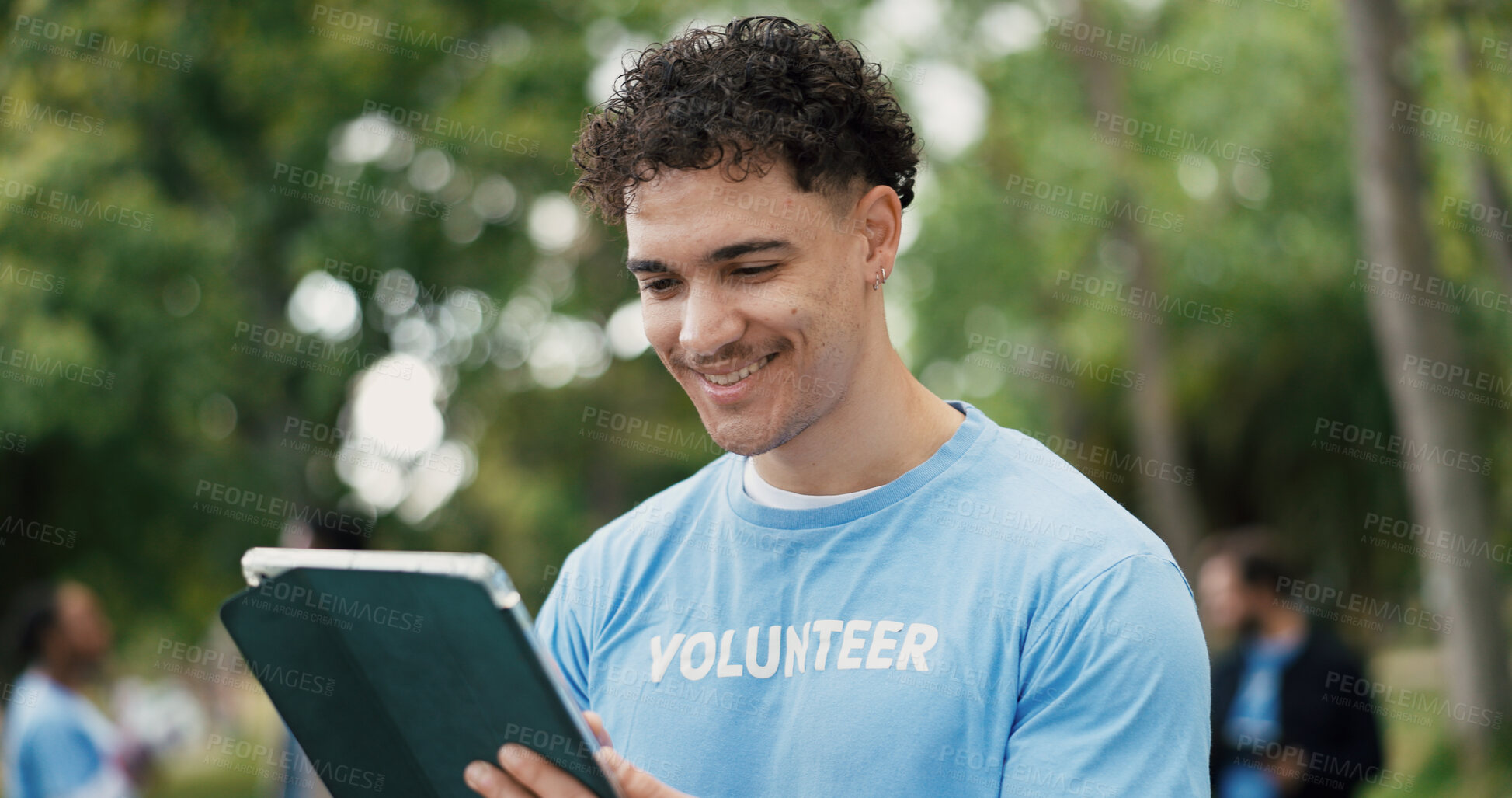 Buy stock photo Happy man, volunteer or park with tablet for online campaign, donation or outreach in nature. Male person, activist or NGO with smile or technology for community service app, charity or eco startup