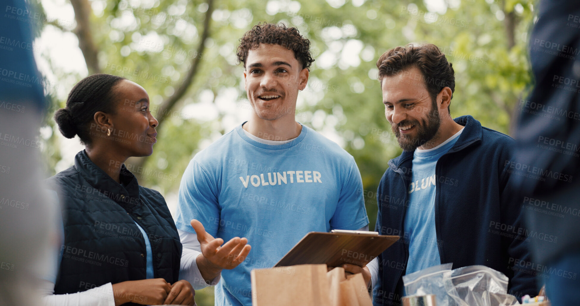 Buy stock photo Happy people, clipboard and volunteer with team for food donation, charity or community service. Group, NGO or society with smile for global outreach, poverty or economic stability in outdoor park