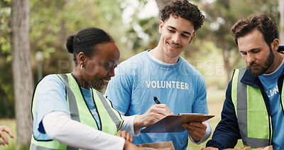 Buy stock photo Checklist, volunteer and people with in park for food drive, community service and packaging for charity event. Teamwork, local ngo and man check donation supply with clipboard, paper bag and outdoor