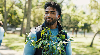 Buy stock photo Volunteer, man and thinking with plant at park for community service, earth day project or NGO. Non profit, person or smile with ideas in nature for sustainable outreach, climate change or initiative