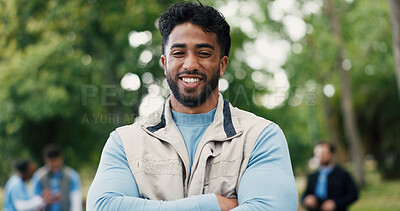 Buy stock photo Arms crossed, volunteer and portrait with man in park for donation, community service and ngo project. Nonprofit pride, grocery distribution and food drive with person outdoor for outreach program