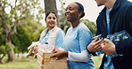 Donations, volunteering and people in park, help and poverty relief with community outreach. Unity, group and friends with food aid, NGO project and teamwork with solidarity, charity and support