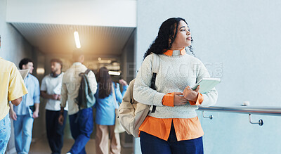 Buy stock photo Woman, college student and tablet with thinking, smile and walk in hallway for scholarship at campus. Girl, reflection and tech with bag, app or learning with perspective for education at university