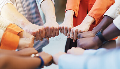 Buy stock photo Business people, fist bump and huddle with diversity for unity, solidarity or mission. Group, employees or colleagues with hands together, support or trust for community circle, inclusion or equality