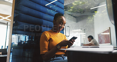 Buy stock photo Phone, pod and typing with designer woman in office for project feedback, pot or update. App, communication and text message with employee in cubicle of design workplace for planning or research