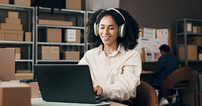 Buy stock photo Ecommerce, headphones or black woman in office with laptop, inventory control or music streaming at work. Logistic, song or supplier in agency with tech, radio or podcast subscription in supply chain