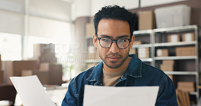 Buy stock photo Businessman, logistics or invoice with documents for delivery checklist, inventory or stock. Man, distributor or supplier reading with paperwork for small business management or supply chain finance