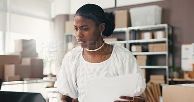 Buy stock photo Black woman, laptop and stress for dropshipping, logistics or documents with distribution error in office. African person, paperwork and admin with supply chain, invoice and frustrated at startup