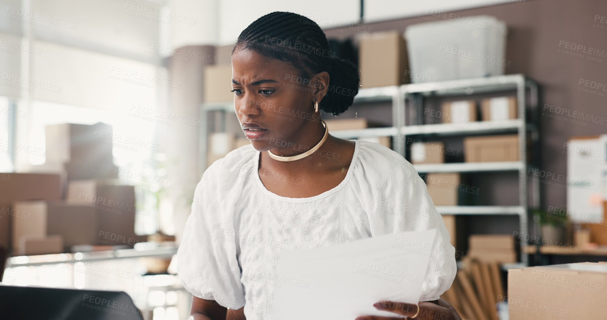 Buy stock photo Black woman, laptop and stress for dropshipping, logistics or documents with distribution error in office. African person, paperwork and admin with supply chain, invoice and frustrated at startup