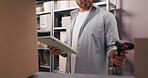 Scanner, tablet and hands of man in office with logistics, ecommerce or distribution for online order. Equipment, digital technology and male entrepreneur with information for delivery with boxes.