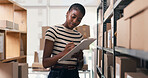 Ecommerce, clipboard and shelf with black woman in warehouse for inspection, shipping and supply chain. Delivery checklist, quality assurance and inventory management with person for distribution
