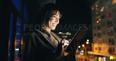 Buy stock photo Happy, businesswoman and tablet on balcony at night for portfolio review, client email or bokeh. Financial advisor, mature person or tech in city for market report, economy news or overtime at office