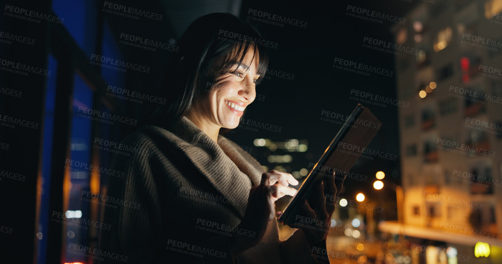 Buy stock photo Happy, businesswoman and tablet on balcony at night for portfolio review, client email or bokeh. Financial advisor, mature person or tech in city for market report, economy news or overtime at office
