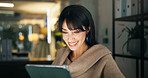 Tablet, night and happy business woman in office, reading report or fact check for article. Company, journalist and mature editor with technology for news story, research and review on overtime