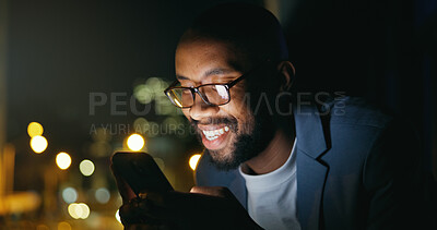 Buy stock photo Texting, night and black man in city with phone, bokeh and funny chat on social media. Happy, glasses and male person on balcony with tech, online communication or meme post in evening message.