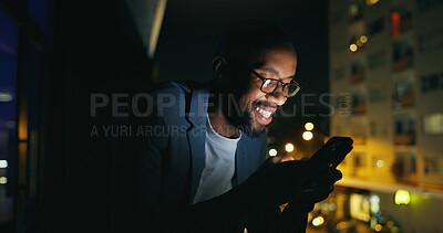 Buy stock photo Night, businessman and typing with phone on balcony for trading account, economy news and bokeh. Trader, black person and happy with smartphone at office in city for stocks price or investment profit