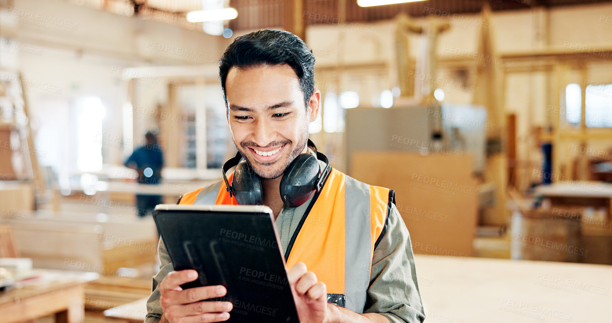 Buy stock photo Man, carpenter and tablet with smile at workshop, scroll and review with furniture manufacturing job. Person, click and happy with tech for woodwork, application and feedback for design at factory