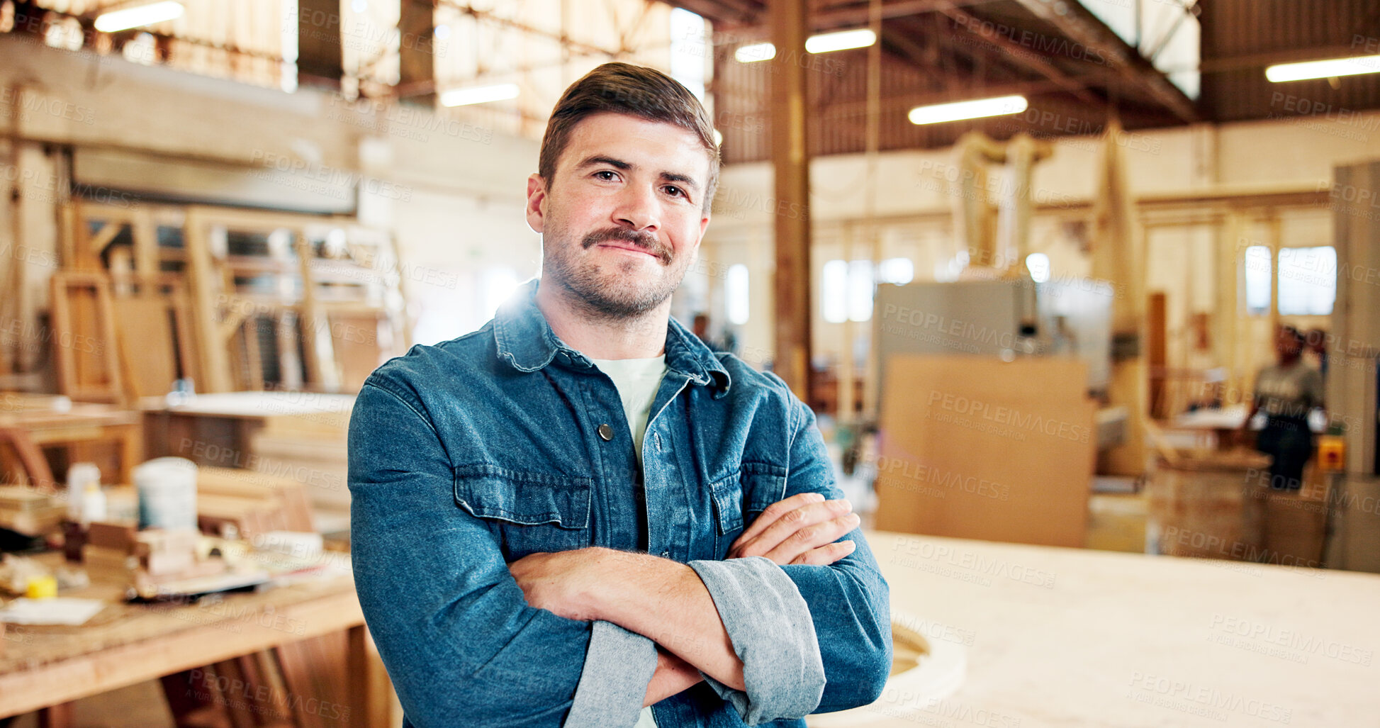 Buy stock photo Carpenter, portrait and man with arms crossed, workshop and happy for craftsmanship or manufacturing. Artisan, pride and person with smile for production, creative and career growth in small business