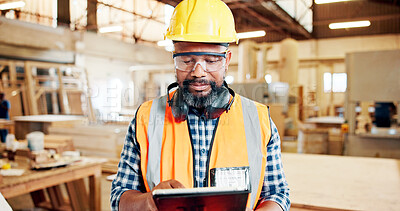 Buy stock photo Tablet, black man and woodworker in workshop for furniture manufacturing, design or production. Digital technology, safety gear and African mature carpenter with research for lumber quality assurance