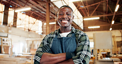Buy stock photo Carpentry, entrepreneur and man with arms crossed, portrait and workshop for production and woodwork. Confident, artisan and black person with smile in warehouse, manufacturing and career development