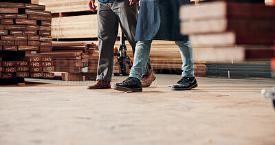 Buy stock photo Carpentry, walking and legs of people in workshop for woodworking, timber production and teamwork. Carpenter, collaboration and feet of workers in factory for lumber, wood and construction business