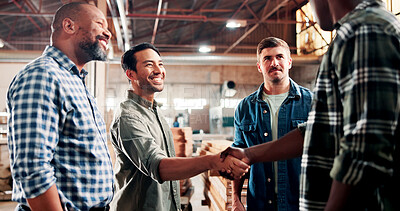 Buy stock photo Carpentry, handshake and people in meeting in workshop for woodworking, timber business and agreement. Carpenter, collaboration and workers shaking hands for lumber production, deal and partnership