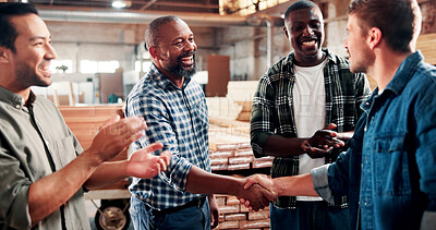 Buy stock photo Carpentry, handshake and people in meeting in factory for woodworking, timber business and agreement. Carpenter, collaboration and workers shaking hands for lumber production, deal and partnership