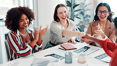 Buy stock photo Women, meeting or applause with handshake for deal, business agreement or promotion in office. Female people, employees or colleagues shaking hands with smile or team for congratulations or thank you