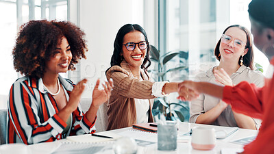 Buy stock photo Business women, meeting or applause with handshake for deal, agreement or promotion in office. Female people, employees or colleagues shaking hands with smile or team for congratulations or thank you