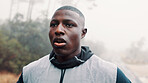 Tired, outdoor and black man with fitness, training and breathing with wellness, rest and break. African person, runner or healthy athlete with exercise, exhausted and hobby with fatigue or challenge