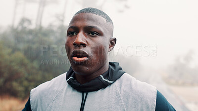 Buy stock photo Tired, outdoor and black man with fitness, training and breathing with wellness, rest and break. African person, runner or healthy athlete with exercise, exhausted and hobby with fatigue or challenge