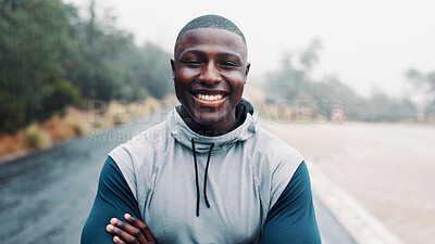 Buy stock photo Outdoor, road and portrait of black man with arms crossed, marathon runner and ready for cardio training. Fitness, morning mist and happy athlete with endurance exercise, confidence and start workout