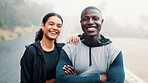 Fitness, portrait and smile of interracial couple outdoor together for cardio training, running or workout. Arms crossed, exercise and mist with happy people in nature for health, sports or wellness