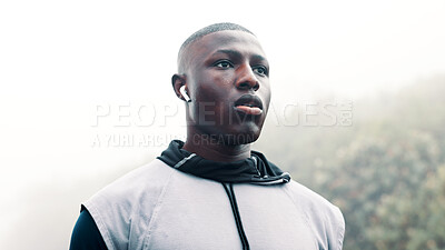 Buy stock photo Fitness, fog and man with earphones outdoor to start running, music playlist and cardio podcast. Athlete, black person and ready for exercise in nature with audio streaming, wellness workout or mist