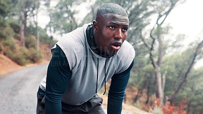 Buy stock photo Tired, outdoor and black man with training, breathing and hobby with wellness, rest and cardio. African person, runner or healthy athlete with exercise, exhausted or morning with fatigue or challenge