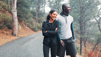 Buy stock photo Happy couple, fitness and road with nature for outdoor workout, exercise or training together. Interracial, active man and woman with smile, mist or fog for winter challenge, health or wellness