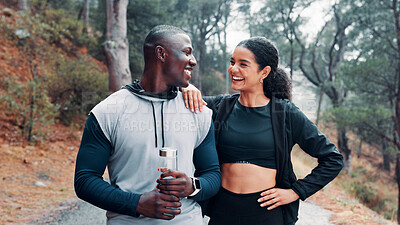 Buy stock photo Interracial couple, fitness and smile together in nature for adventure trail, exercise and wellness. Forest, man and woman for health, cardio workout and explore or travel with morning walk bonding
